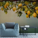 Wall murals Lemons hanging from branch above.