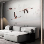 Wall murals Group of flamingos flying over water