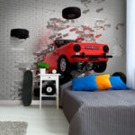 Wall murals Car crashes through brick wall.