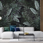 Wall murals Lush tropical leaves and fireflies.