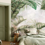 Wall murals Green leaves on misty background.