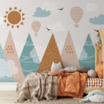 Wall murals Mountains and balloons under sunny sky.