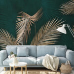 Wall murals Elegant palm leaves on teal background.