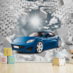 Wall murals Blue car bursts through brick wall.