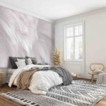 Wall murals Delicate white feathers in light.