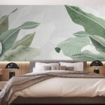 Wall murals Green leaves on pastel background.