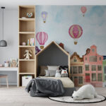 Wall murals Group of buildings with hot air balloons