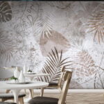Wall murals Tropical leaves in muted tones