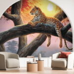 Wall murals Leopard lounging on tree at sunset.