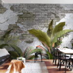Wall murals Brick wall with leaves and a brick wall