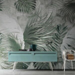 Wall murals Tropical leaves with intricate patterns