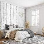 Wall murals Birch forest with gentle greenery.