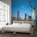 Wall murals Statue of liberty with a city in the background