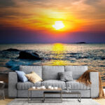 Wall murals Sunset over a beach