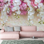 Wall murals Orchids cascading over pink blooms.