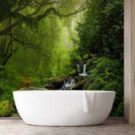 Wall murals Misty forest with flowing stream.