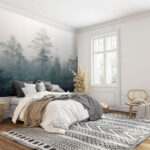 Wall murals Foggy forest with trees