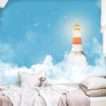 Wall murals Lighthouse in the clouds