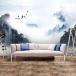 Wall murals Birds flying over a mountain