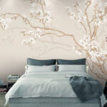 Wall murals Birds perched on blooming branches.