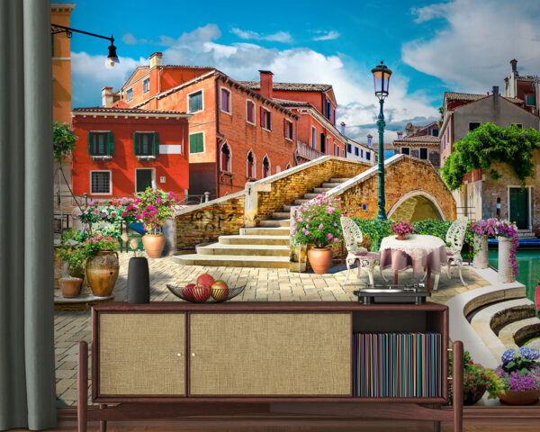 Wall murals Patio with a table and chairs and a fountain in front of a building Wall murals Patio with a table and chairs and a fountain in front of a building