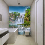 Wall murals Cascading waterfall amid lush greenery.
