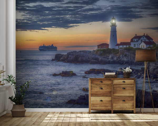 Wall murals Lighthouse on a rocky shore with a cruise ship in the background Wall murals Lighthouse on a rocky shore with a cruise ship in the background