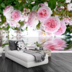 Wall murals Pink roses reflected on water.