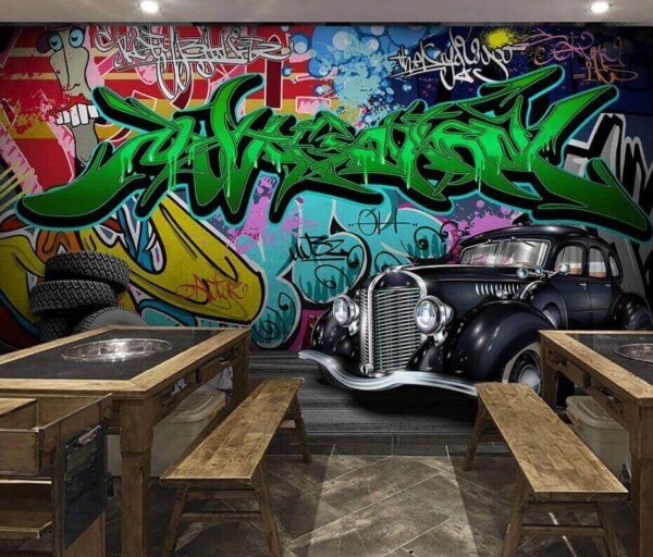 Wall murals Black car with wheels in front of a colorful wall Wall murals Black car with wheels in front of a colorful wall