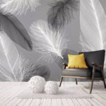 Wall murals Delicate feathers on gray background.