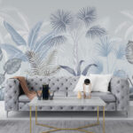 Wall murals Tropical leaves in soft hues.