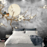 Wall murals Birds nestled on blossoming branch.