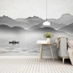 Wall murals Boat on water with mountains in the background