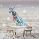 Wall murals Giraffe wearing a scarf and a pink scarf in the sky