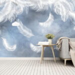 Wall murals White feathers on a blue background