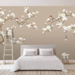 Wall murals Sparrows resting on blossoming branches.