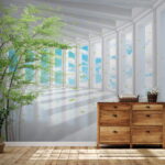 Wall murals Sunlit corridor with vibrant leaves.