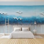 Wall murals Painting of birds flying over a blue ocean