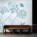 Wall murals Blue flowers and butterflies in harmony.