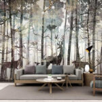 Wall murals Deer wander through the foggy forest.