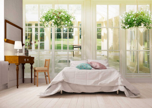Wall murals Sunlit room with hanging plants (SKU: u52614)