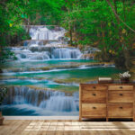 Wall murals Waterfall in the middle of a forest