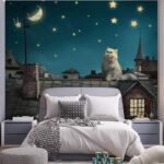 Wall murals Cat gazes at the night sky.