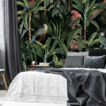 Wall murals Parrots nestled among jungle leaves.