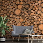 Wall murals Stacked tree logs in circular pattern.