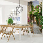 Wall murals Stone alley with flowers and plants