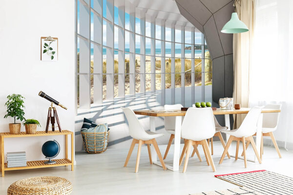 Wall murals Sunny beach view through geometric windows