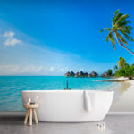 Wall murals Beach with palm trees and straw umbrellas