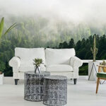 Wall murals Foggy forest with trees