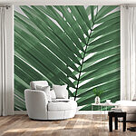 Wall murals Vibrant green palm leaf pattern.